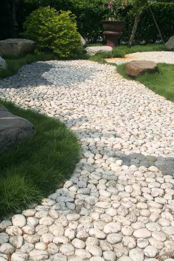 white pebbles pathway - decorative pebbles